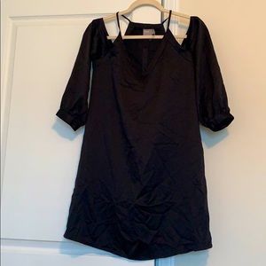Black mini cold shoulder dress.